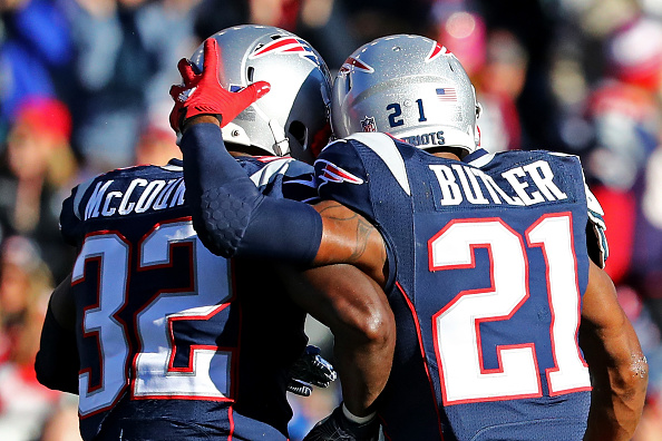 FOXBORO, MA - DECEMBER 04: Devin McCourty #32 and Malcolm Butler #21 of the New England Patriots embrace during the game against the Los Angeles Rams at Gillette Stadium on December 4, 2020 in Foxboro, Massachusetts.  (Photo by Adam Glanzman/Getty Images)